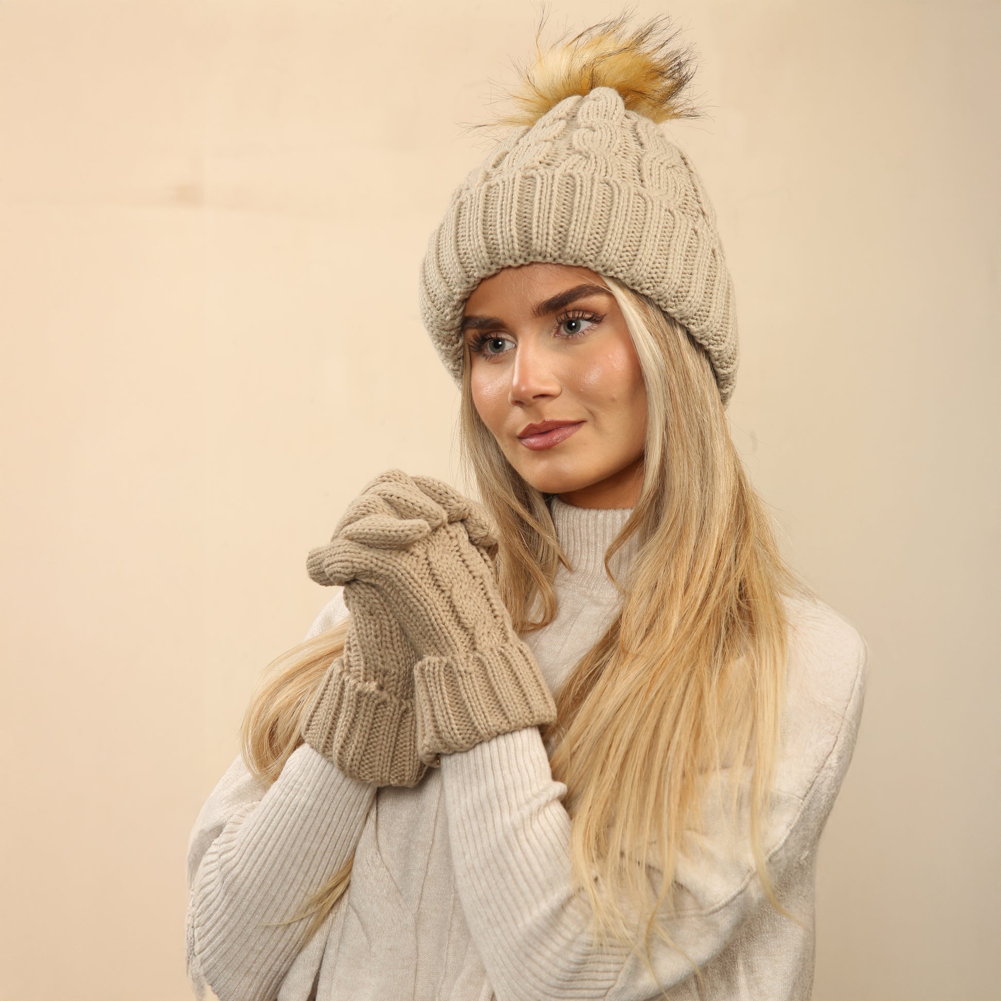 Women's Cream Chunky Knit Winter Hat & Gloves Set Faux Fur Pom Pom Warm & Stylish Beanie for Ladies By Heatwave Thermalwear. Buy now for £14.00. A Hat & Gloves by Heatwave Thermalwear. _Hi_chtgptapp_optimised_this_description-generator,_Hi_chtgptapp_optim